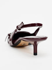 High heel slingback with buckle and pointed toe