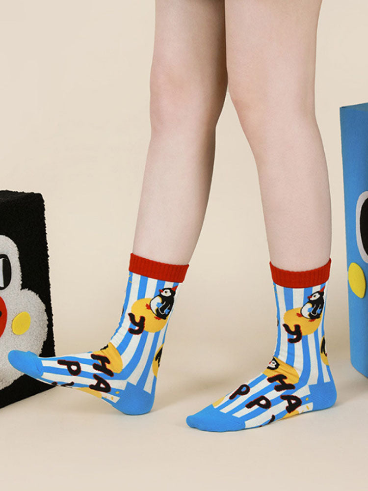 Calzini con pois e pinguino da cartone animato carino