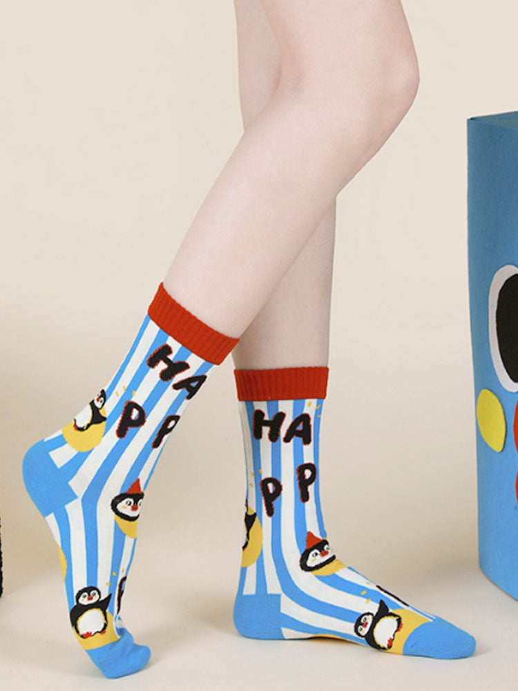 Calzini con pois e pinguino da cartone animato carino