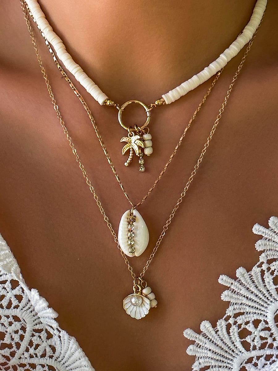 Collana multistrato con ciondolo a conchiglia e girasole